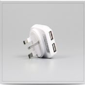 Universal travel adapter with 2 usb port images