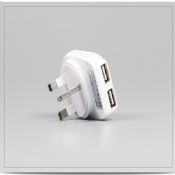 Universal travel adapter with 2 usb port images