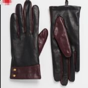 Ladies smart phone wearing leather gloves images